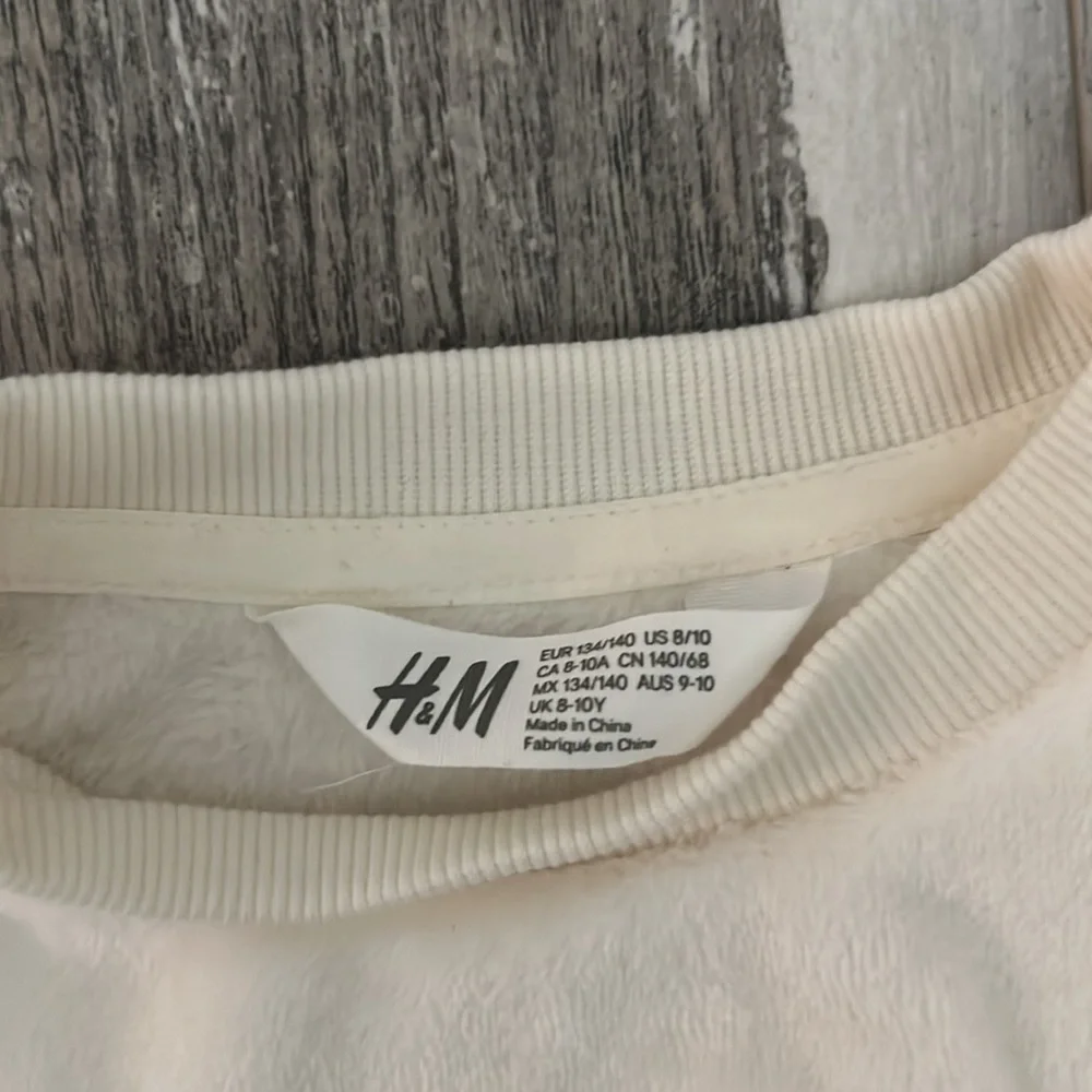 H&M Cream Unicorn Flippy Sweater
